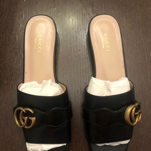 Gucci slide sandal with double GG.